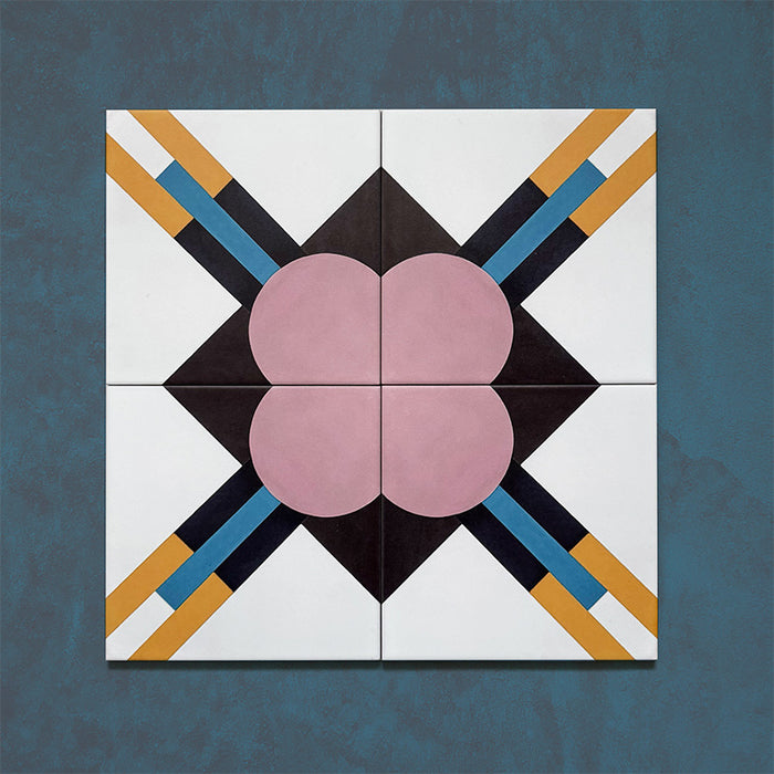 Four-tile layout of the Geometry Contour 20x20cm patterned tile, featuring intersecting mustard, teal, and navy lines forming a central diamond motif, with soft pink quarter circles in each corner against a white and deep charcoal background.