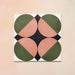 Group image showing four Geometry Moon 20x20cm geometric patterned tiles arranged to form a circular motif, featuring green and terracotta semicircles with black and cream corner details, photographed against a soft peach-toned background.