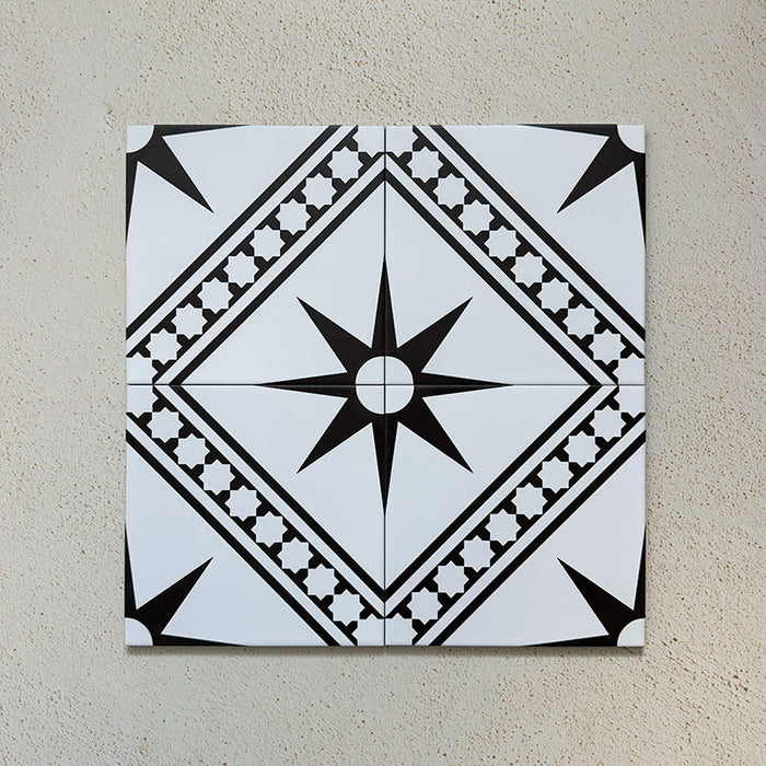Galata White Moroccan style 20x20cm patterned tiles, shown as a flat lay to highlight the repeating black and white geometric star pattern.