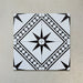 Galata White Moroccan style 20x20cm patterned tiles, shown as a flat lay to highlight the repeating black and white geometric star pattern.