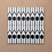 Alhambra Felisa 20x20cm Moroccan tiles displayed in a set of four, showcasing a bold black and white pattern with teardrop-shaped motifs and fine vertical lines for a modern Moroccan-inspired look.
