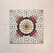Cabana La Calle 20x20cm Moroccan-style porcelain tiles shown as a set of four, forming a full circular mosaic pattern in cream, blush, burgundy, beige, and green tones on a soft pink background