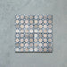 Four Bedouin Mequinez Blue Moroccan-style ceramic tiles, 15x15cm each, arranged to display the repeating geometric star and cross pattern in soft blue, beige, and cream tones on a textured surface background.