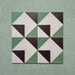 Four-piece layout of Geometry Angles Patterned Tiles, each 20cm x 20cm, featuring a geometric design of green, white, and black triangular segments forming interlocking diamond shapes, displayed on a textured green background.