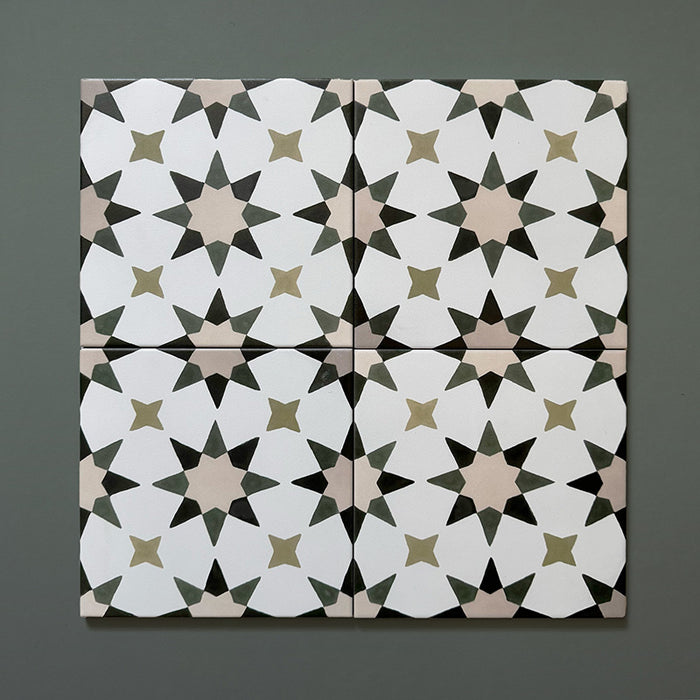 Agraba Natural 20x20cm Moroccan tiles shown in a 4-tile layout with an eight-point star design in beige, olive, and taupe on a white background, highlighting the intricate geometric pattern and colour harmony.