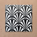Alhambra Casa 20x20cm Moroccan tiles shown in a four-tile layout, featuring a bold black and white fan pattern inspired by Art Deco design, ideal for statement walls or stylish interiors.