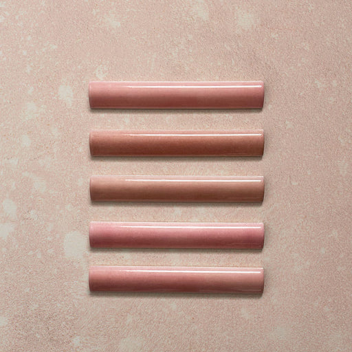 Zellij Rose Pink bullnose trim, 3cm x 20cm, Moroccan style glazed ceramic, featuring warm rose pink tones, subtle tonal variation, glossy finish, and gently rounded edges for a handcrafted decorative edge detail.