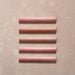 Zellij Rose Pink bullnose trim, 3cm x 20cm, Moroccan style glazed ceramic, featuring warm rose pink tones, subtle tonal variation, glossy finish, and gently rounded edges for a handcrafted decorative edge detail.