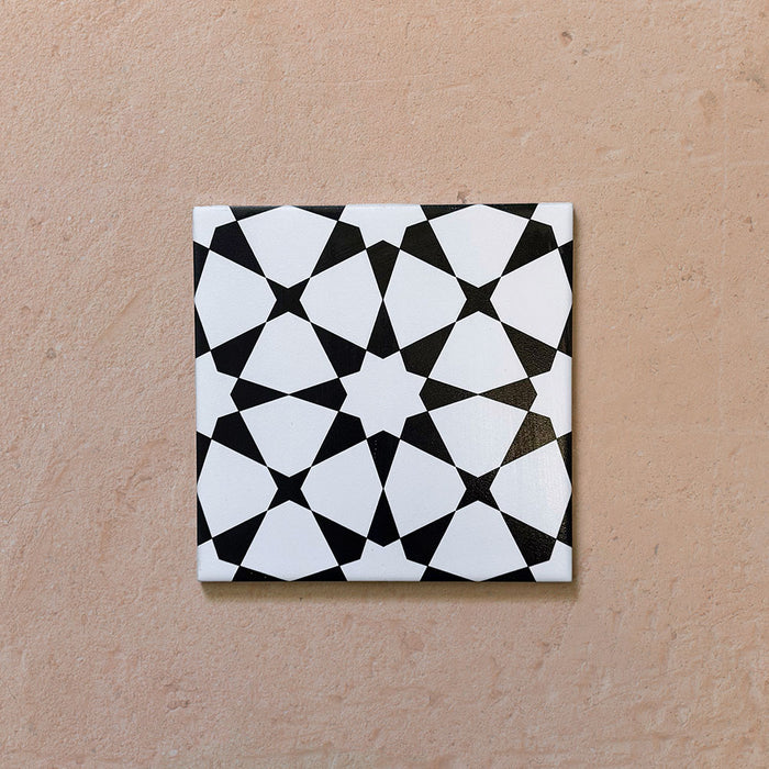 Single Agraba Black and White 20x20cm Moroccan-style ceramic tile with geometric pattern, suitable for walls and floors.