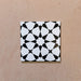 Single Agraba Black and White 20x20cm Moroccan-style ceramic tile with geometric pattern, suitable for walls and floors.