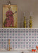 Agraba Mini Atlas 15cm x 15cm Moroccan style tiles, showcasing an intricate geometric pattern in soft blue, burgundy and white across a statement kitchen splashback, finished with warm brass details.