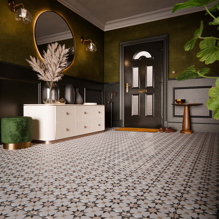 Hallway interior featuring Agraba Natural 20cm x 20cm Moroccan style ceramic floor tiles, showcasing a soft neutral geometric pattern, styled with dark green walls, classic panelling, and contemporary furniture.