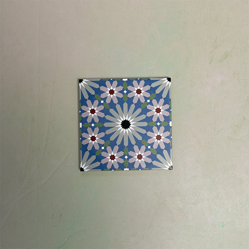 Fizaan Artisan Mini Moroccan-style 15×15cm porcelain tile featuring a blue, green and soft pink geometric star pattern.
