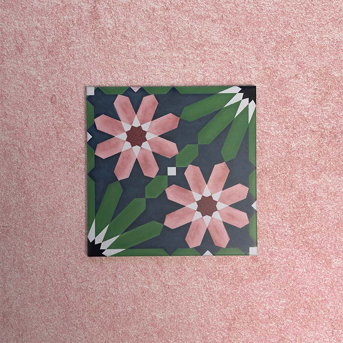 Fizaan Autumn Moroccan-style 20×20cm porcelain tile featuring a dark blue, green and pink geometric floral pattern.