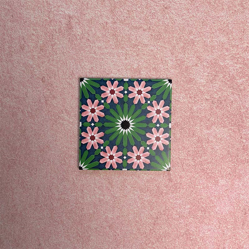 Fizaan Autumn Mini Moroccan-style 15×15cm porcelain tile featuring green and pink geometric floral star motifs.