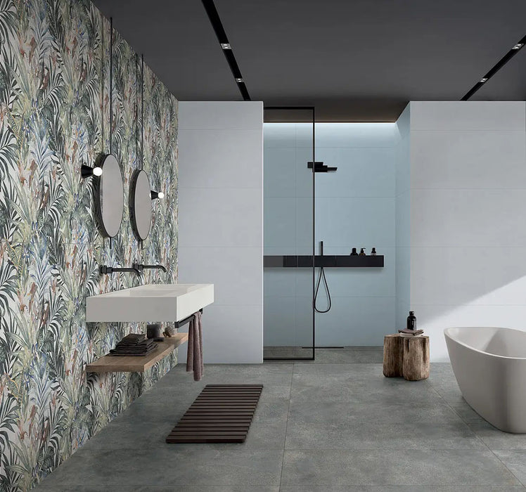 Bathroom featuring Barbados 60 × 120cm wall tiles, creating a full-height botanical feature wall with layered tropical detail. Paired with minimalist fittings and concrete-effect flooring for a clean, contemporary contrast.