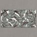 Bassano Bali 3D Décor 60 × 120cm patterned wall and floor tile featuring layered tropical leaf detailing in soft green, grey, and marble-effect tones with a bold contemporary decorative finish.