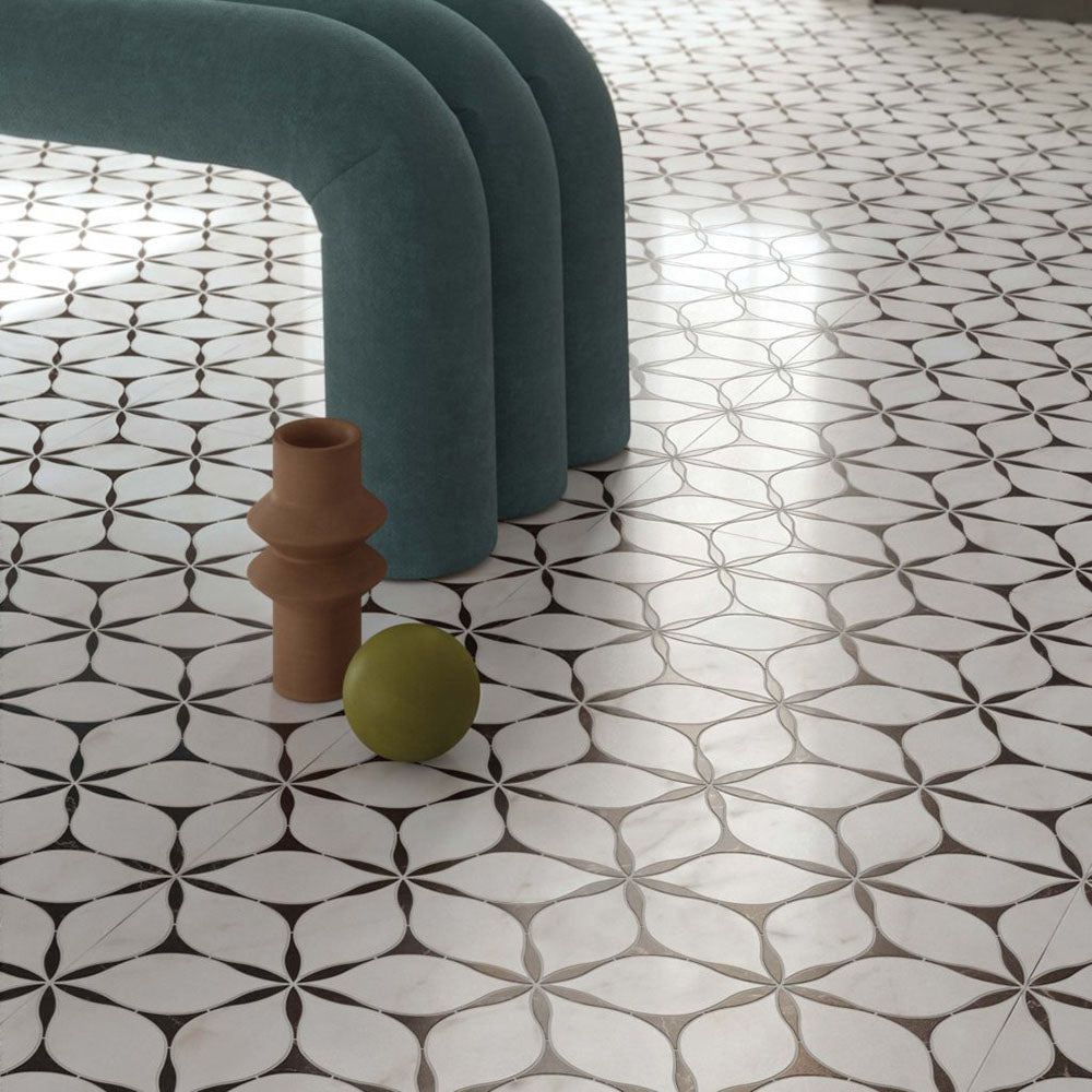 Interior featuring Bassano Flowers 3D Décor 60 × 120cm patterned wall and floor tiles, styled with sculptural furniture, soft neutral tones, and contemporary decorative accents for a bold, design-led modern space.