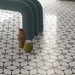 Interior featuring Bassano Flowers 3D Décor 60 × 120cm patterned wall and floor tiles, styled with sculptural furniture, soft neutral tones, and contemporary decorative accents for a bold, design-led modern space.