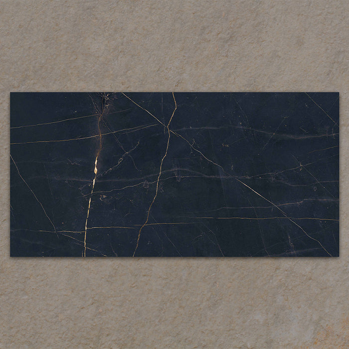Bassano Precious Noir Lux 3D 60 × 120cm marble-effect wall and floor tile featuring deep black tones with dramatic gold veining and a luxurious contemporary polished finish.