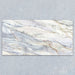 Bassano Quartz Lux 3D 60 × 120cm marble-effect wall and floor tile featuring soft white tones with flowing grey and gold veining and a luxurious contemporary polished finish.