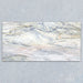 Bassano Quartz Lux 3D 60 × 120cm marble-effect wall and floor tile featuring flowing white, grey, and subtle gold veining with a luxurious contemporary polished finish.