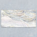 Bassano Quartz Lux 3D 60 × 120cm marble-effect wall and floor tile featuring flowing white, grey, and subtle gold veining with a luxurious contemporary polished finish.