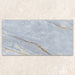 Single tile display of Bassano River Blue Matt 60 × 120cm marble-effect wall and floor tiles, featuring soft blue tones, flowing gold and beige veining, and a smooth matt finish inspired by elegant natural stone.