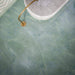 Close-up of Bassano Sea Green Lux 3D 60 × 120cm marble-effect wall and floor tiles, showcasing soft green tones, delicate natural veining, and a luxurious contemporary polished finish.