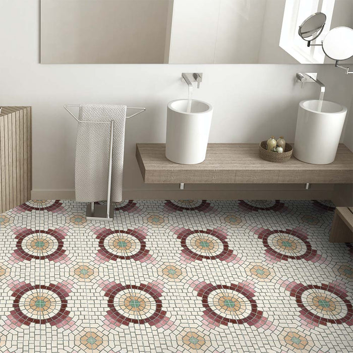Modern bathroom featuring Cabana La Calle 20x20cm Moroccan-style porcelain tiles on the floor, displaying a circular mosaic pattern in burgundy, cream, and blush tones paired with a minimalist wood vanity and twin basins.