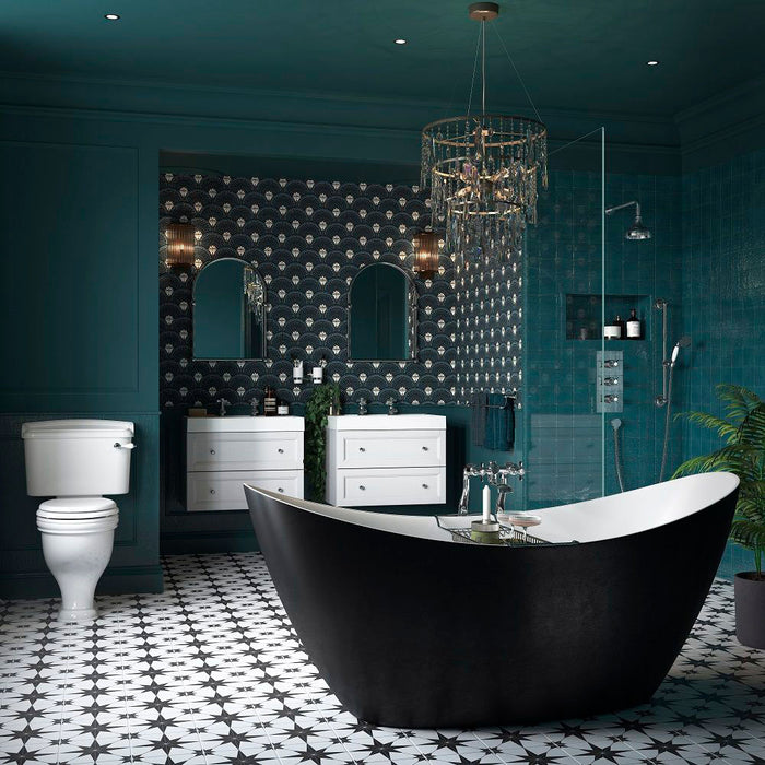 Bathroom setting featuring Pole Star Black Moroccan-style 25x25cm patterned porcelain floor tiles, creating a bold geometric look beneath twin white vanity units and dark cabinetry.