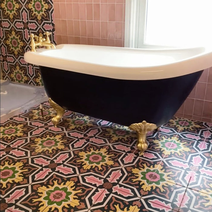 Bathroom featuring Cabana Havana 20x20cm Moroccan-style ceramic tiles on the floor and wall, styled with a black clawfoot bathtub and gold fittings