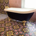 Bathroom featuring Cabana Havana 20x20cm Moroccan-style ceramic tiles on the floor and wall, styled with a black clawfoot bathtub and gold fittings