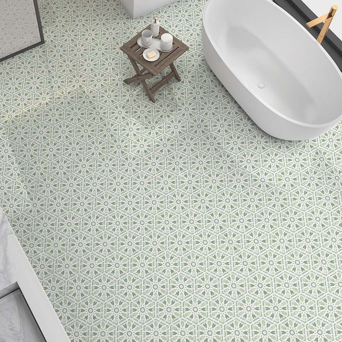 Maroush Mareshan Verde Green 18.7x21.6cm Moroccan hexagonal tiles used in a modern bathroom setting, featuring soft green tones and intricate white star patterns for a calming, elegant spa-like feel.