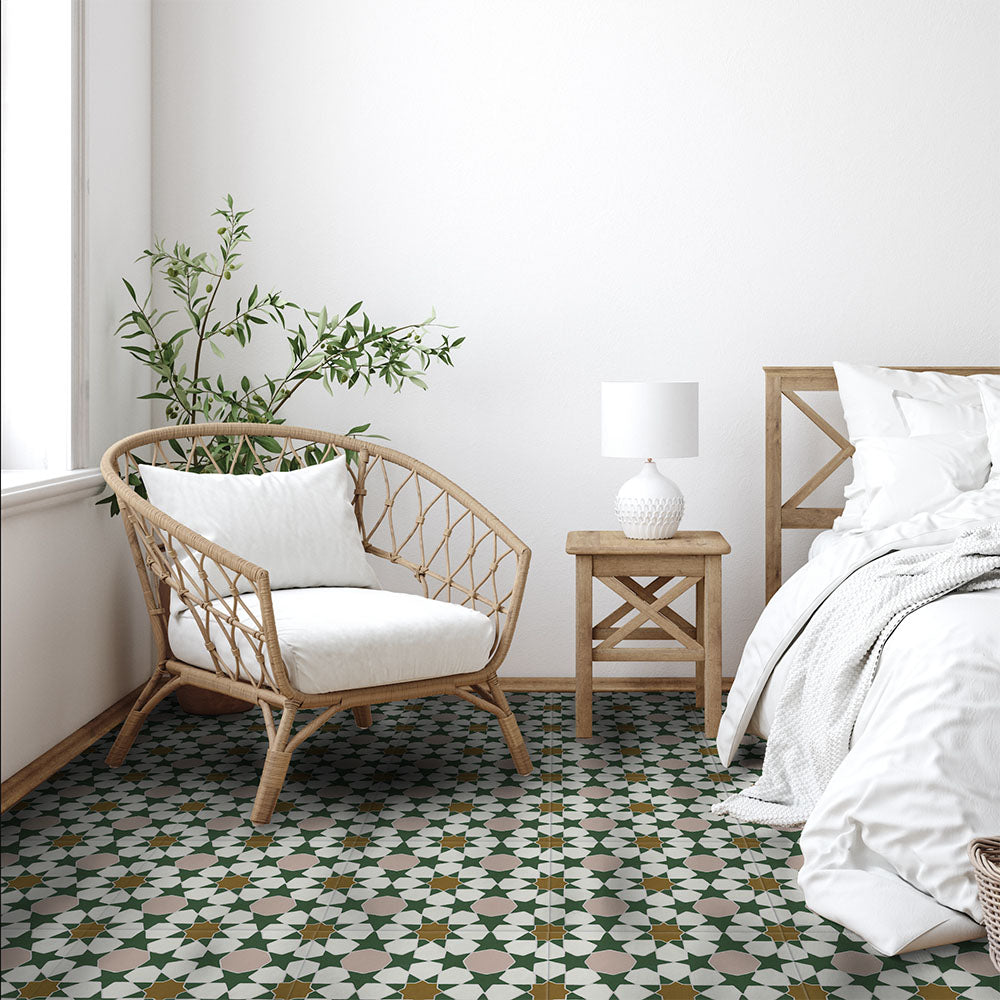 Cabana Tanane Moroccan Style 20x20cm tiles used in a bedroom setting featuring a geometric star and cross pattern in green, beige, and white tones with a matt finish, paired with light wood furniture and white bedding for a natural, calming look.