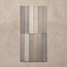 Close-up of Belem Grey 5cm x 30cm artisanal porcelain wall tiles, showcasing the slim brick format, soft grey and taupe tones, subtle surface texture and natural-looking tonal variation.