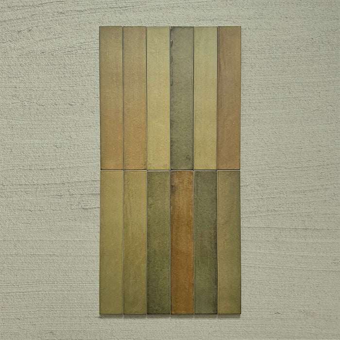 Close-up of Belem Olive Green 5cm x 30cm artisanal porcelain wall tiles, showcasing the slim brick format, earthy olive green tones, subtle surface texture and natural-looking tonal variation.