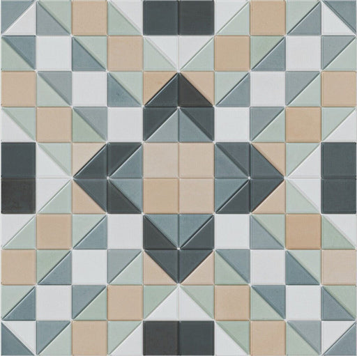 Flat lay of Belgravia Marina Plus Mosaic 28 × 28cm Victorian style patterned tiles, featuring geometric motifs in soft blue, green, beige and charcoal tones, arranged to create a detailed, structured decorative design.