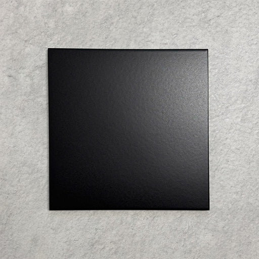 Single Chessboard Black 25×25cm Victorian-style porcelain tile with a smooth satin finish, shown against a light textured background.
