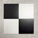 Four Chessboard Black and White 25×25cm Victorian-style porcelain tiles arranged in a classic chequerboard layout to showcase colour contrast, finish, and pattern potential, displayed against a light textured background.