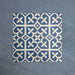 Iris Blue Victorian Moroccan-style 20x20cm patterned porcelain tiles arranged in a tiled group, showcasing a classic blue and white decorative design.