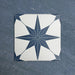 Pole Star Blue Moroccan-style 25x25cm patterned porcelain tile, featuring a bold blue star motif on a crisp white background.