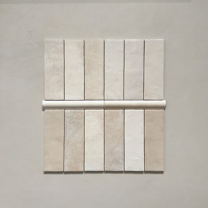 Zellij Bone bullnose tile in a 3cm x 20cm format, Moroccan style, featuring soft bone-beige tones, a glossy finish, and gentle handmade surface variation.