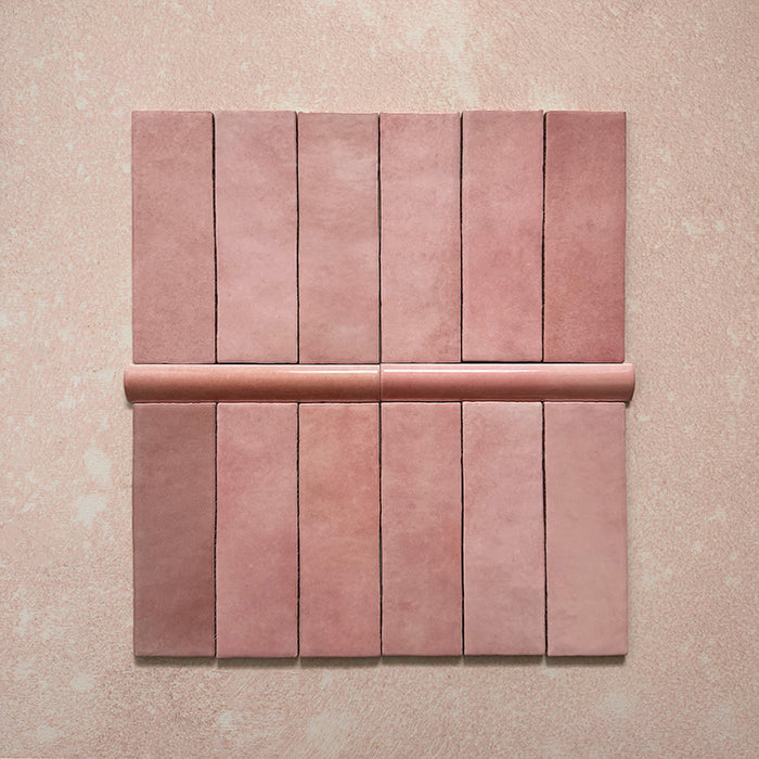 Zellij Rose Pink bullnose trim, 3cm x 20cm, Moroccan style glazed ceramic, featuring warm rose pink tones, subtle tonal variation, glossy finish, and gently rounded edges for a handcrafted decorative edge detail.