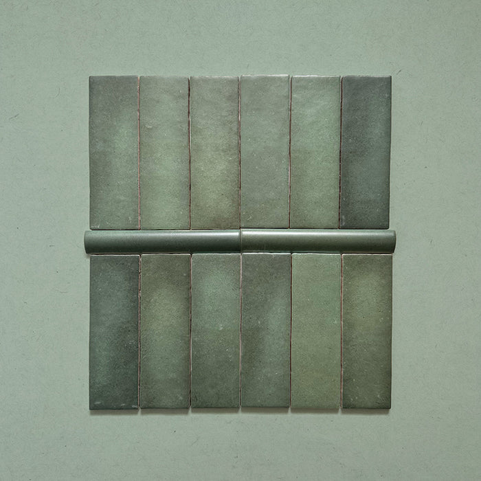 Zellij Malachite Green Bullnose Moroccan Style 3cm x 20cm, glossy bullnose edge tiles in deep malachite green tones with subtle tonal variation, smooth rounded profile, and handcrafted Moroccan-inspired finish, suitable for trims, borders, and decorative edging.