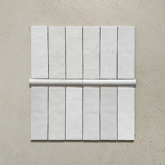 Zellij White Gloss Bullnose Moroccan-style trims in a 3cm x 20cm format, featuring a glossy white glaze and smooth rounded profile, displayed as a flat lay on a neutral background.