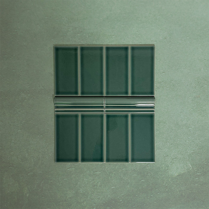 Flat lay showing Finchley Golders Green 7.5 × 15cm ceramic wall tiles with a crackle glaze finish, paired with matching 5 × 15cm dado trim to create a decorative, classic brick-style wall tile layout.