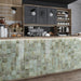 Café featuring Beijing Celadon Green Square 10x10cm Moroccan-style ceramic wall tiles, styled on a coffee bar with wooden shelving, modern lighting and neutral décor.