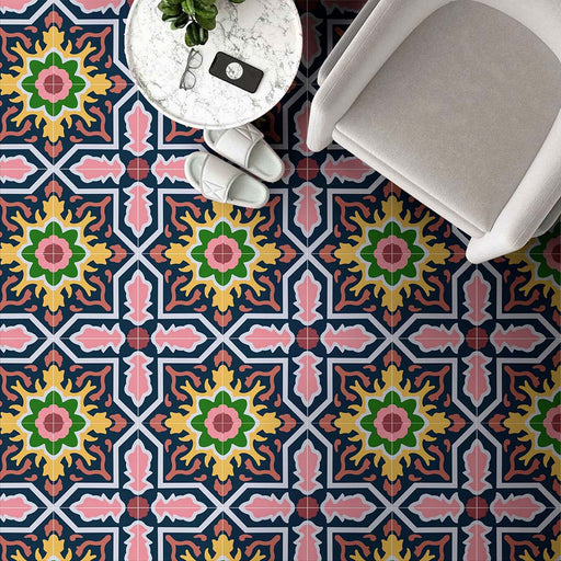 Living room featuring Cabana Havana 20x20cm Moroccan-style ceramic floor tiles in a multicolour floral geometric pattern, styled with a modern chair and marble side table