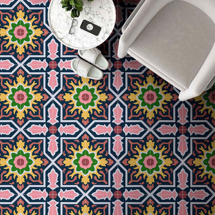 Living room featuring Cabana Havana 20x20cm Moroccan-style ceramic floor tiles in a multicolour floral geometric pattern, styled with a modern chair and marble side table
